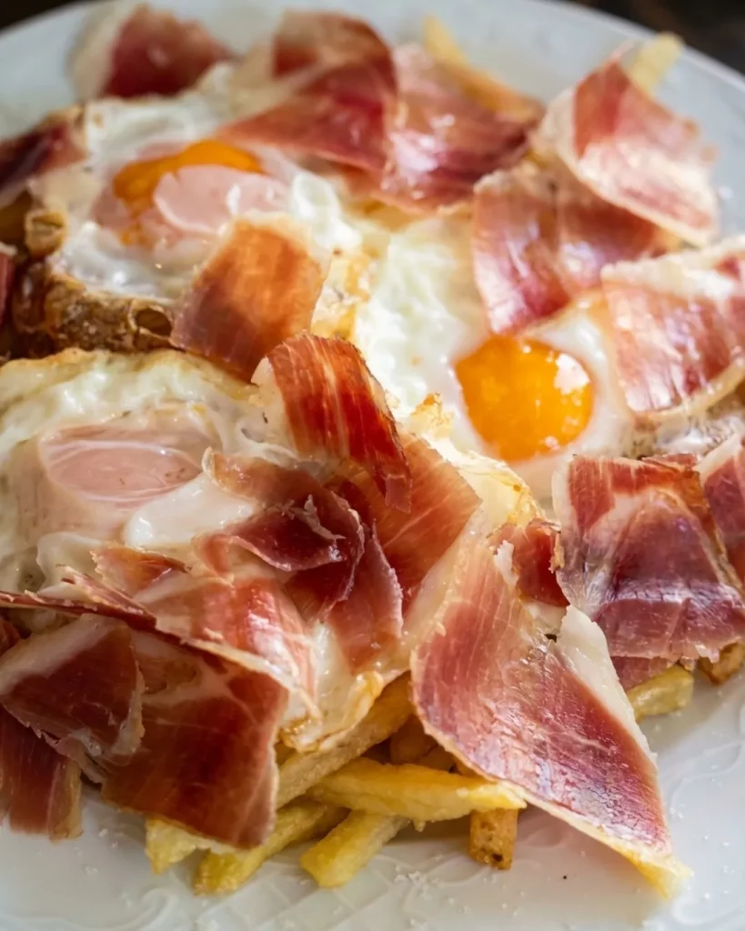 plato de huevos rotos con jamón caseros en Hortaleza Madrid